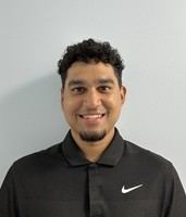 Dr. Aneil Rampersad performing a chiropractic adjustment