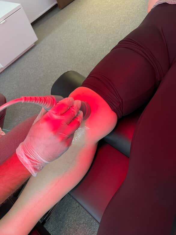 Ultrasound therapy being applied during a physiotherapy session
