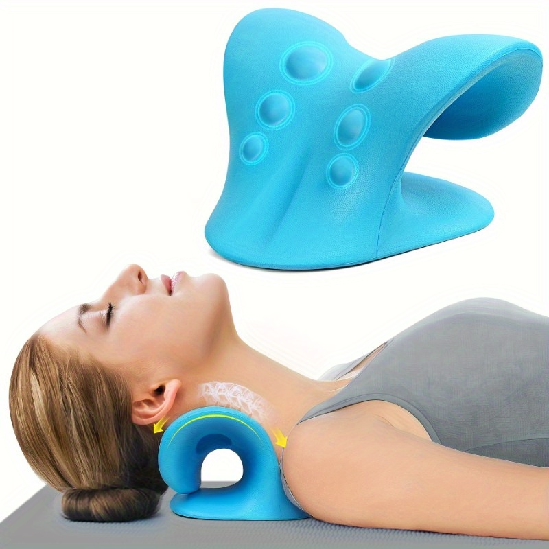 Woman lying on floor using blue C-shaped cervical traction device to relieve neck tension and improve spinal alignment
