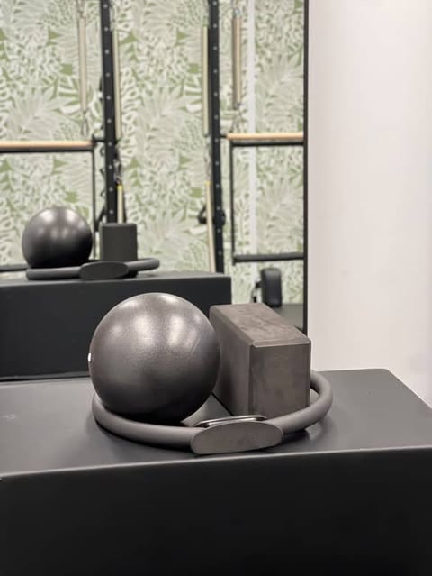 some pilates accessories and props to make the workout easier or more challenging